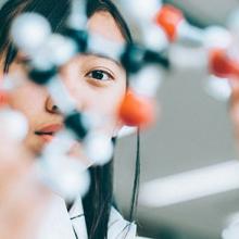Image of student with chem model
