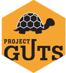 GUTS turtle logo in yellow