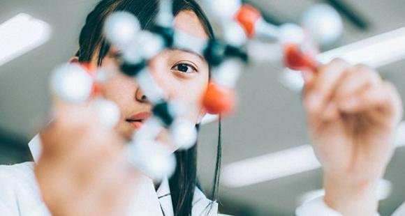 Image of student with chem model